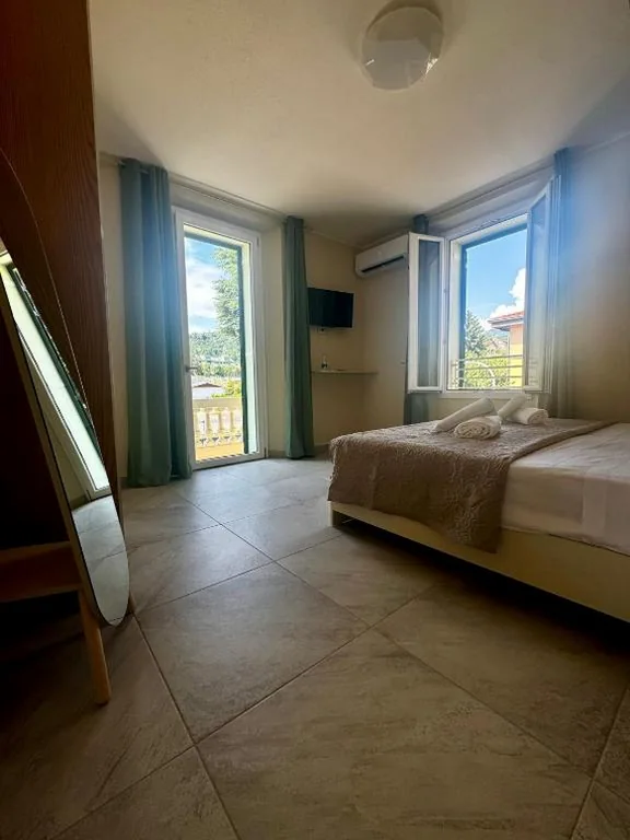 Family Room — Villa Patrizia – Exclusive Suites with Private Parking