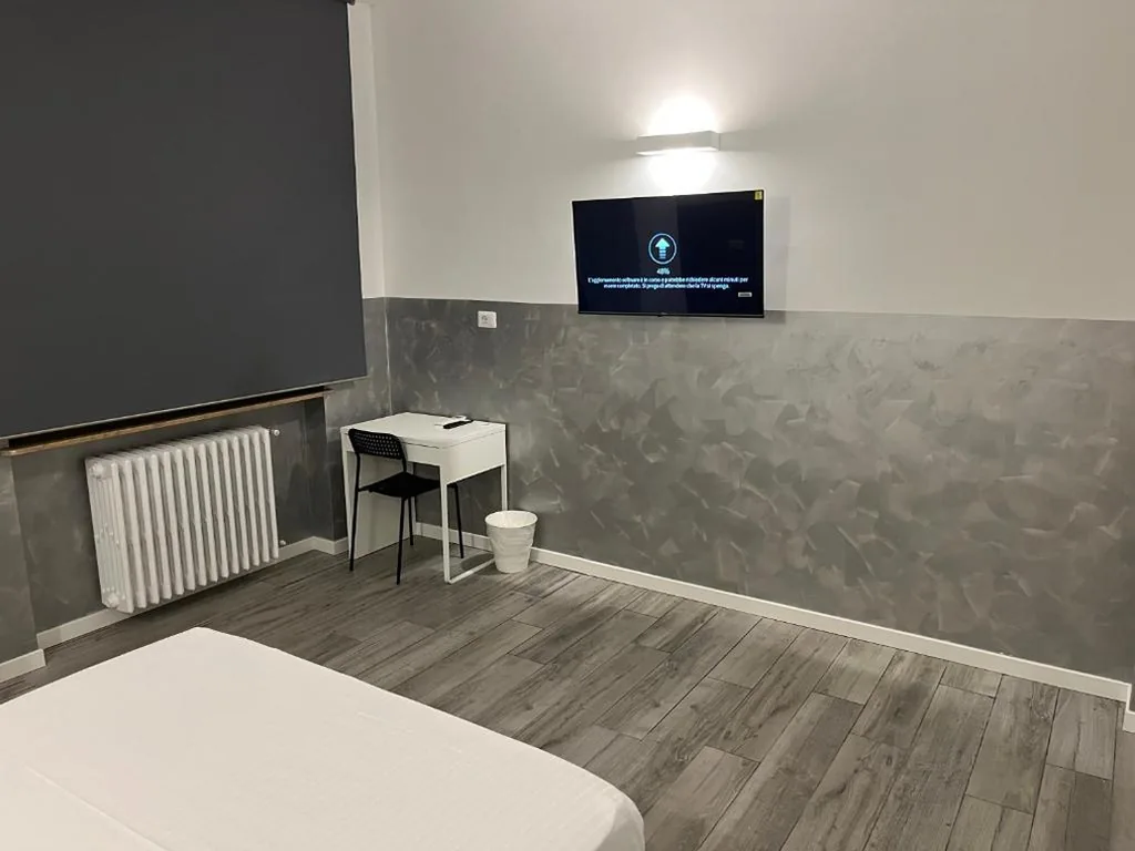 Double Room with Shared Bathroom — BERGAMO AIRPORT ROOMS Self check-in
