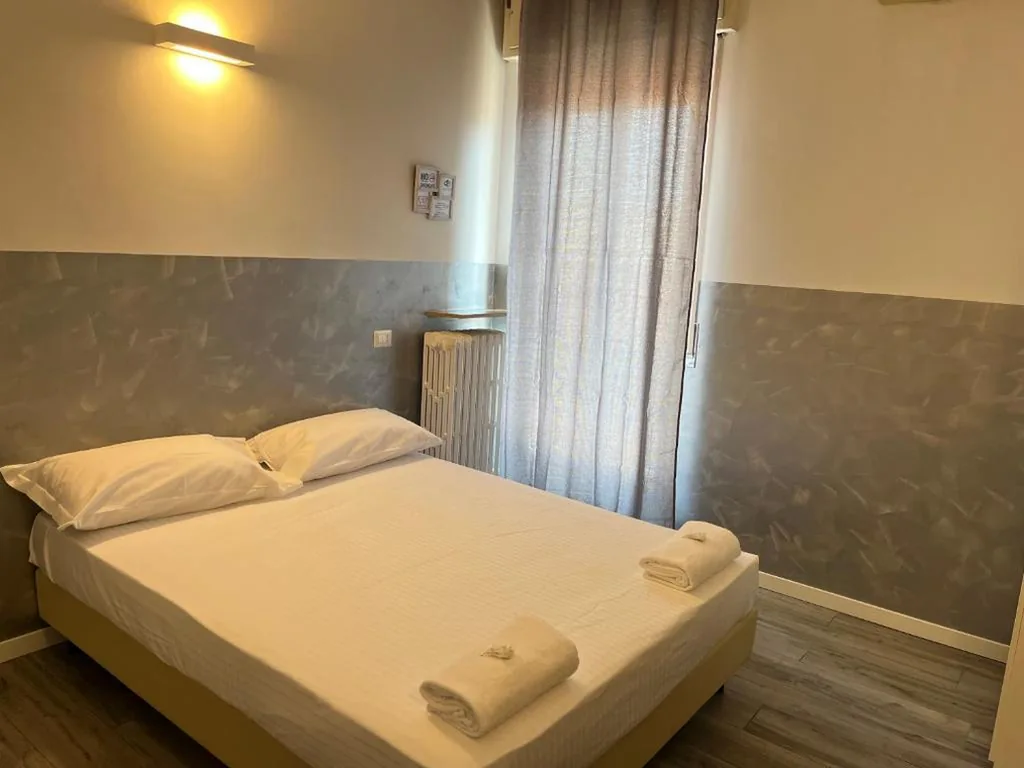 Double Room with Private Bathroom — BERGAMO AIRPORT ROOMS Self check-in