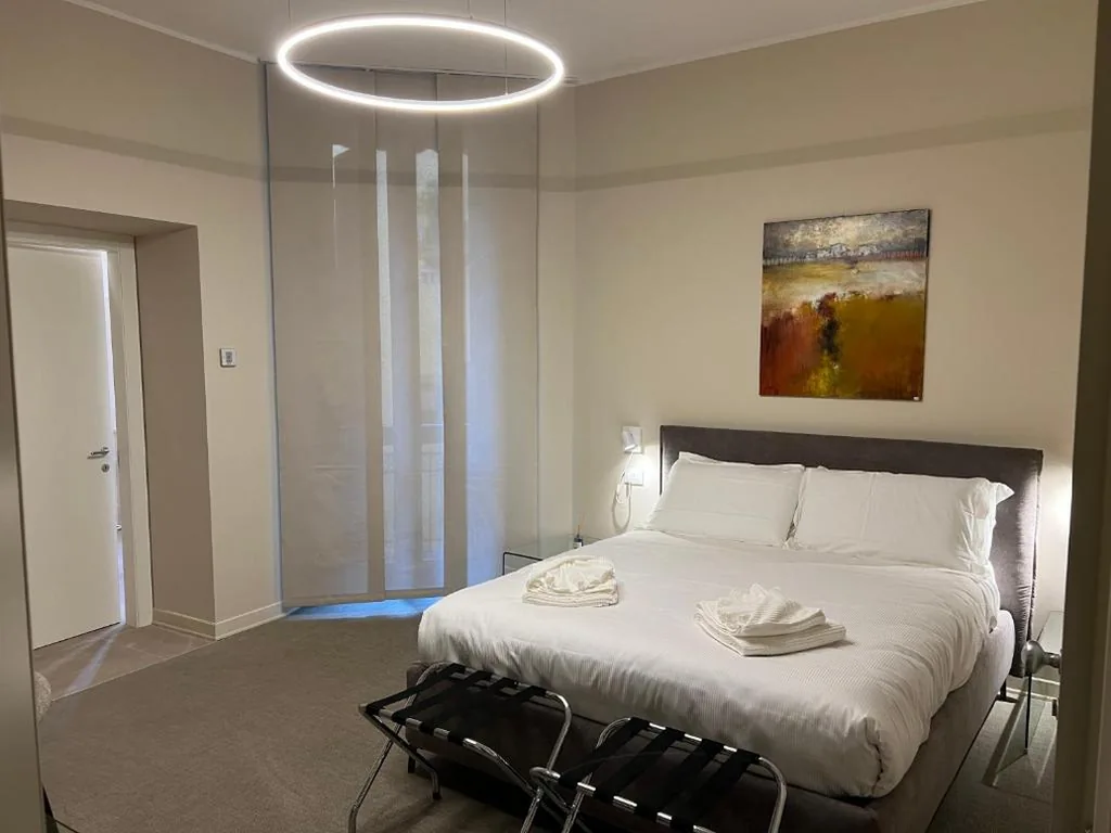 Double Room with Balcony — Foresteria Anguissola Rooms