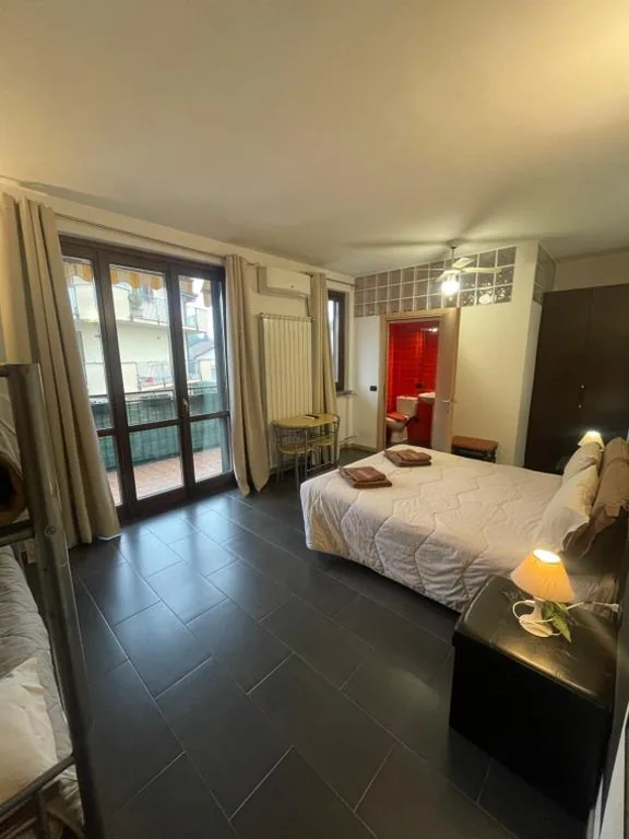 Double Room with Extra Bed — Homely – Malpensa & Fiere Milano