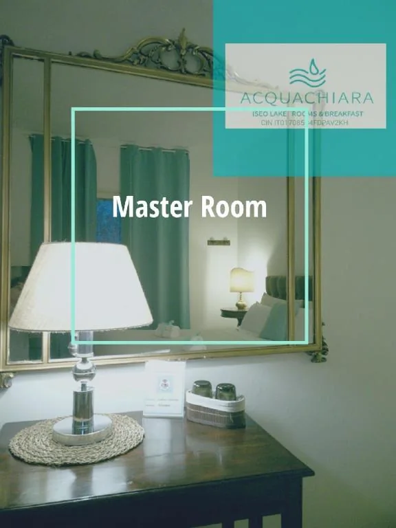 Camera Matrimoniale con Vista Giardino — ACQUACHIARA ISEO CENTER BED AND BREAKFAST villa with PARKING inside Foresteria