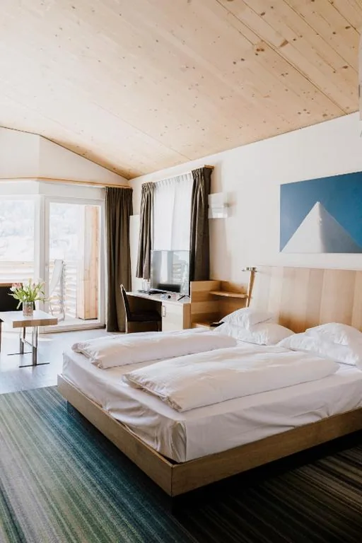 Deluxe Double Room with Balcony — Hotel Lac Salin Spa & Mountain Resort