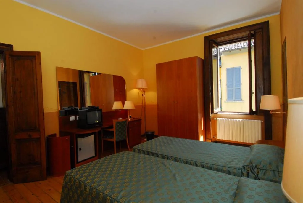 Camera Matrimoniale/Doppia con Letti Singoli con Bagno in Comune — Fiò & Giò
