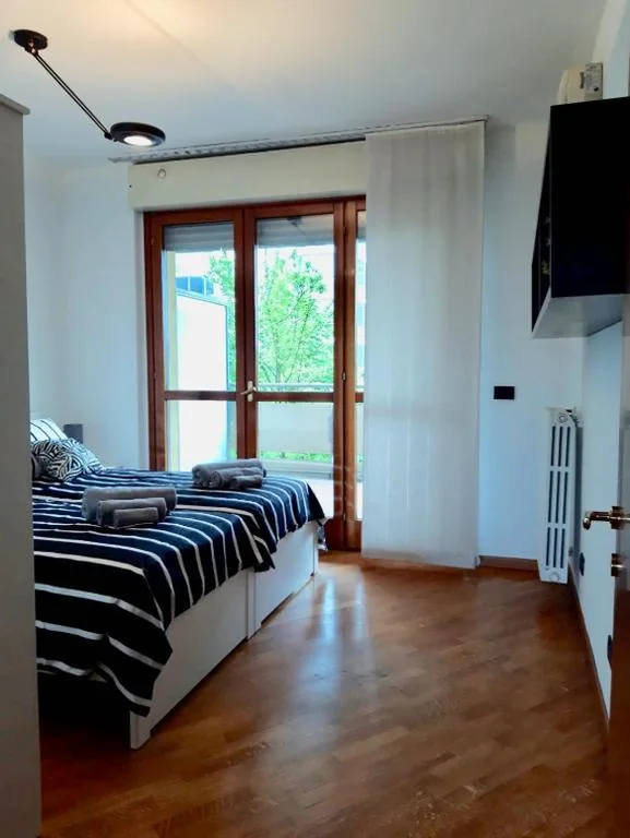 Camera Matrimoniale/Doppia con Letti Singoli con Terrazza — BedandBreakfast Eni Torri Lombarde San Donato BBqueen