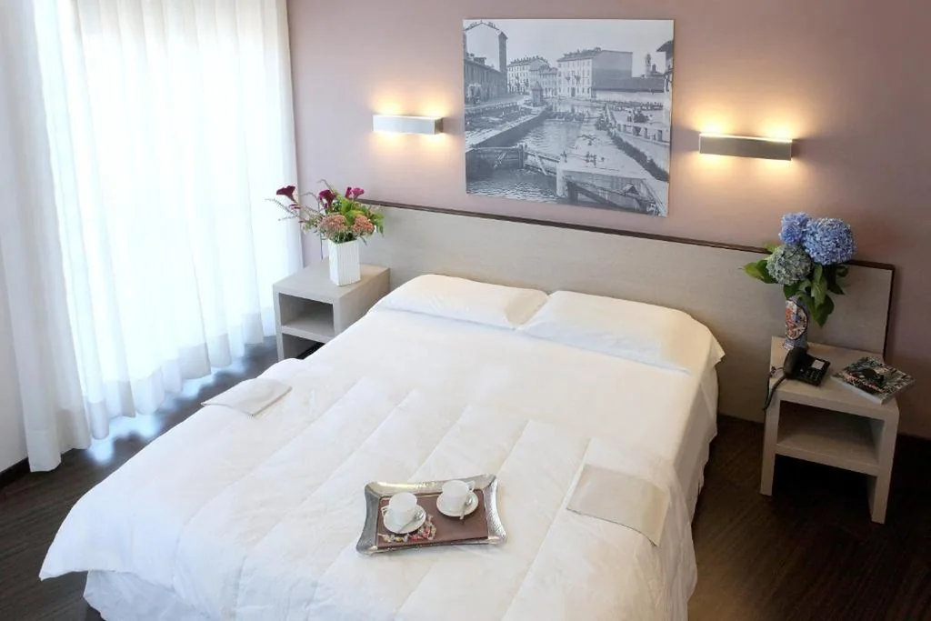 Camera Matrimoniale/Doppia con Letti Singoli — Hotel Mennini