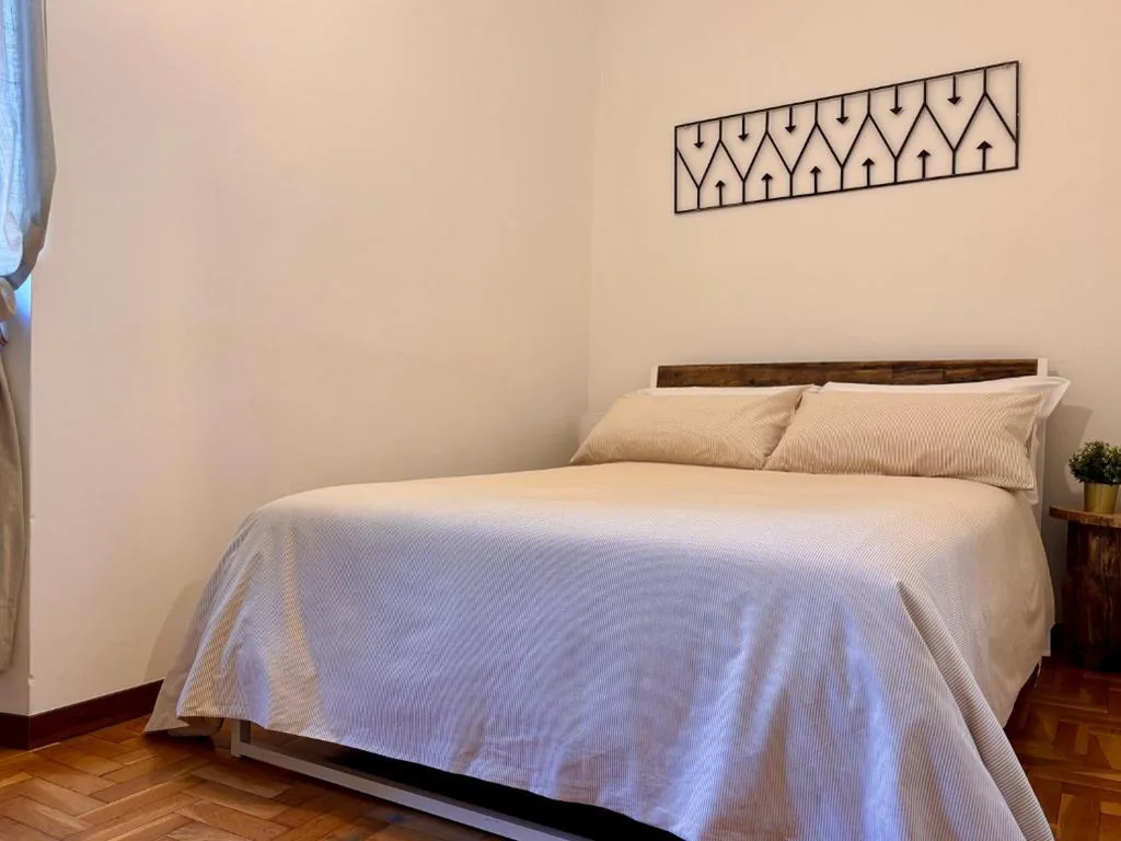 Standard Double Room with Shared Bathroom — Capitolium Ad