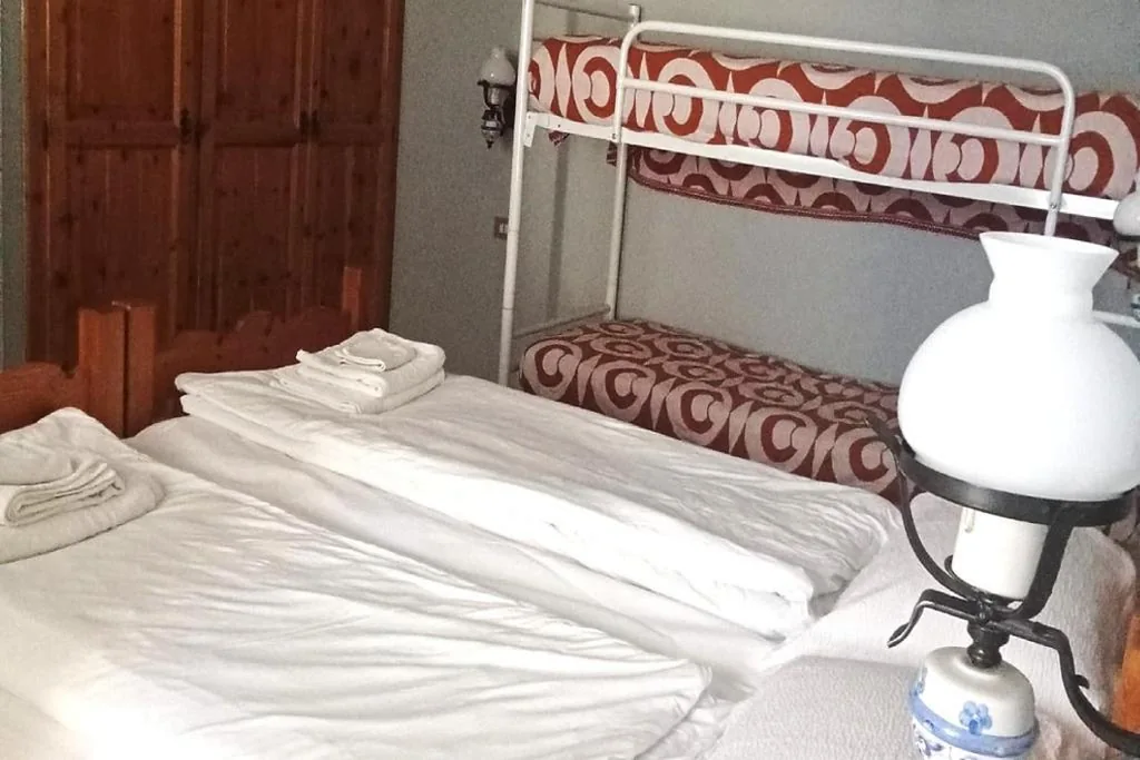 Quadruple Room — Albergo Ristorante Ginepro