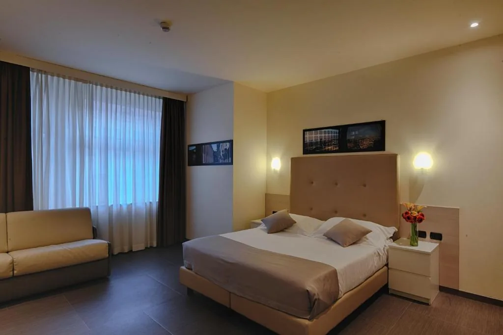 Classic Quadruple Room — Duomo Hotel & Apartments