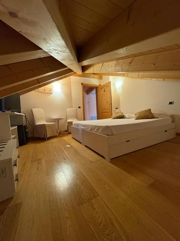 Classic Quadruple Room — Garnì Hotel Tignale