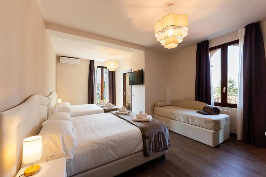 Classic Quadruple Room — Hotel Gardenia Sirmione