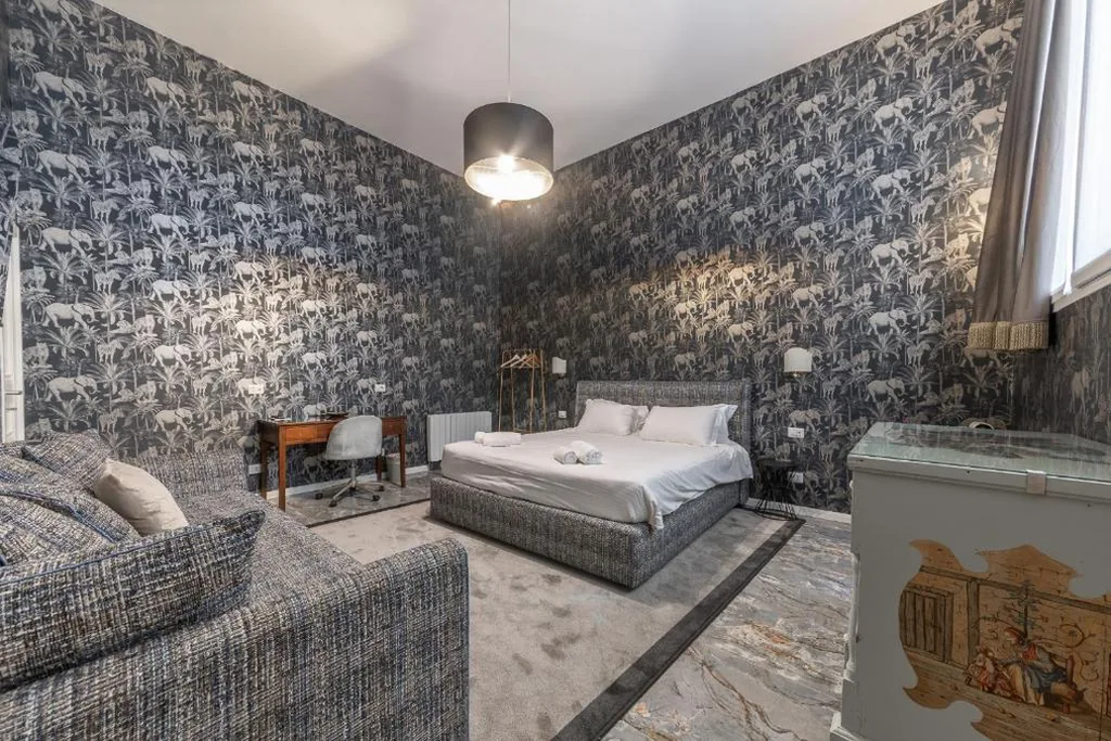 Comfort Quadruple Room — Duomo Smart Suites