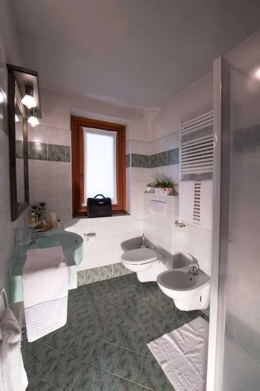 Comfort Quadruple Room — Hotel Alpina