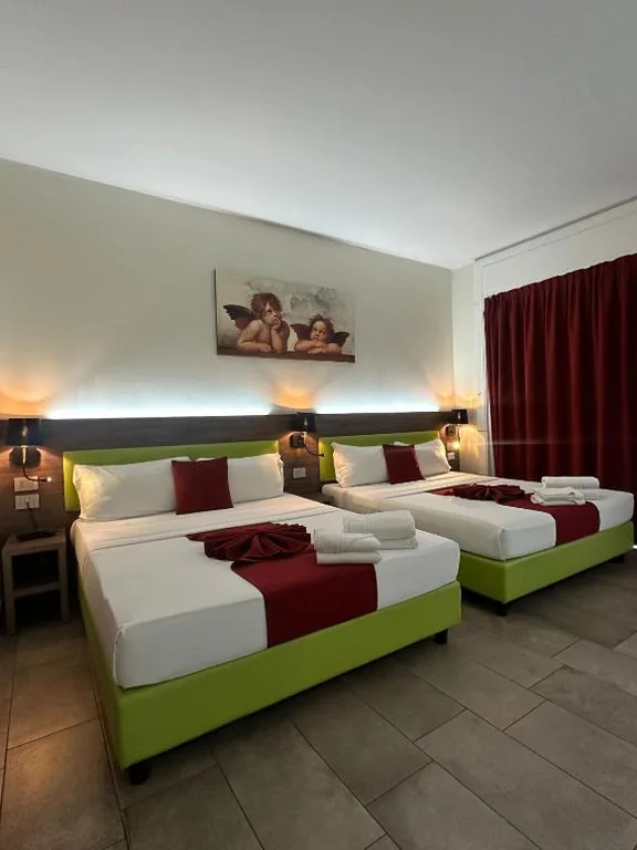 Comfort Quadruple Room — Hotel Stradivari