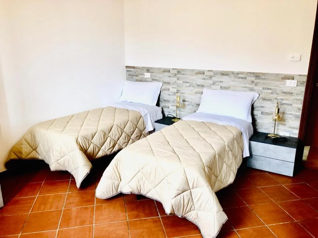 Camera Quadrupla con Bagno — B&B Villa Ermanna
