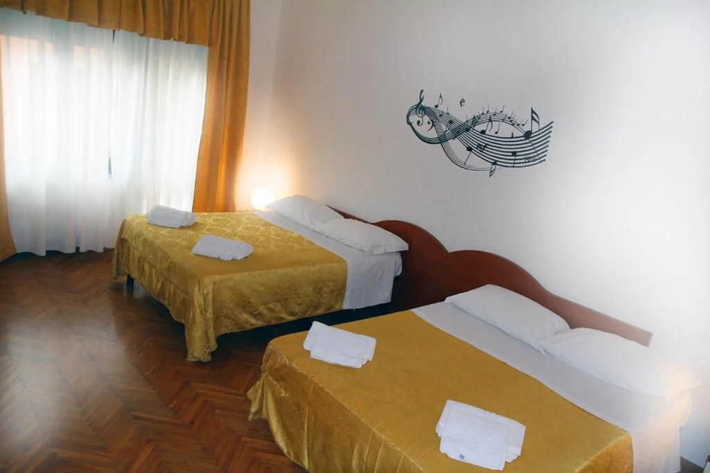 Quadruple Room with Shared Bathroom — B&B Music