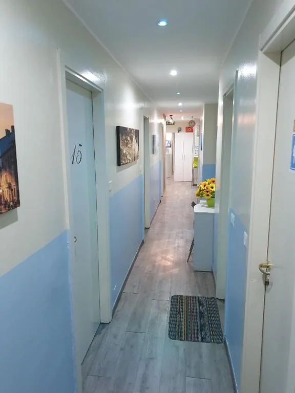 Quadruple Room with Shared Bathroom — Hotel Kennedy