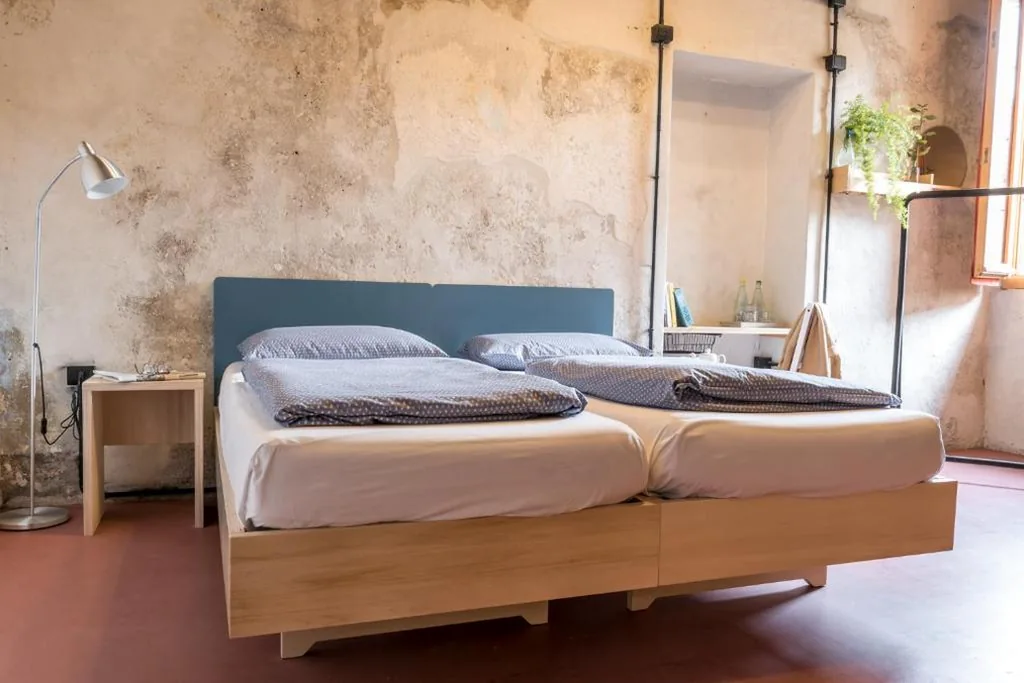 Camera Quadrupla con Bagno Privato Esterno — Un posto a Milano – guesthouse all’interno di una cascina del 700