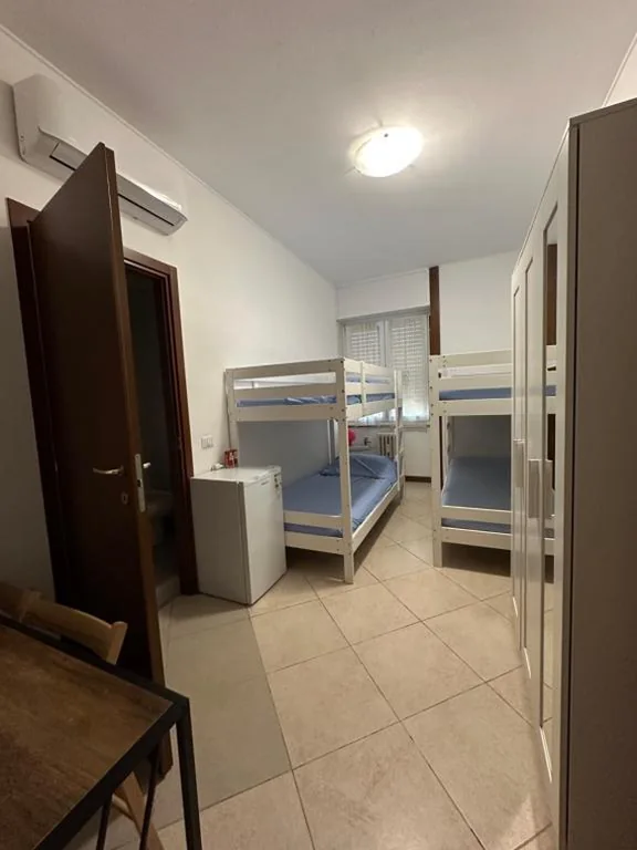 Quadruple Room with Private Bathroom — Gigli, rooms con cucina in comune e terrazza