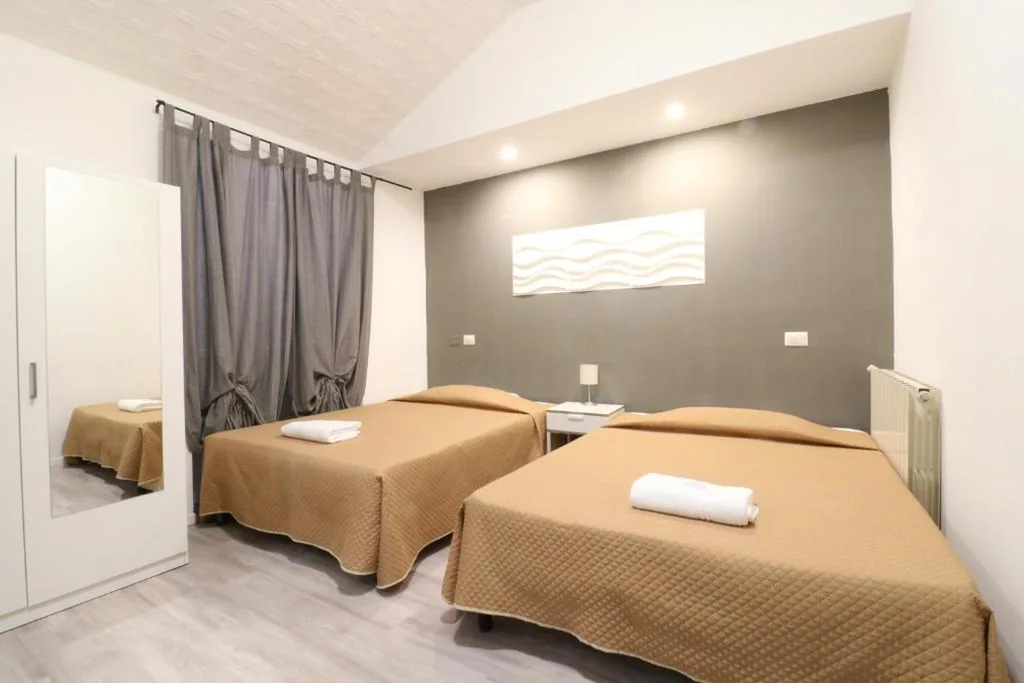Camera Quadrupla con Bagno Privato — Guest House Minas