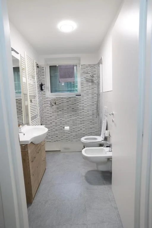 Quadruple Room with Private Bathroom — Haus Villa