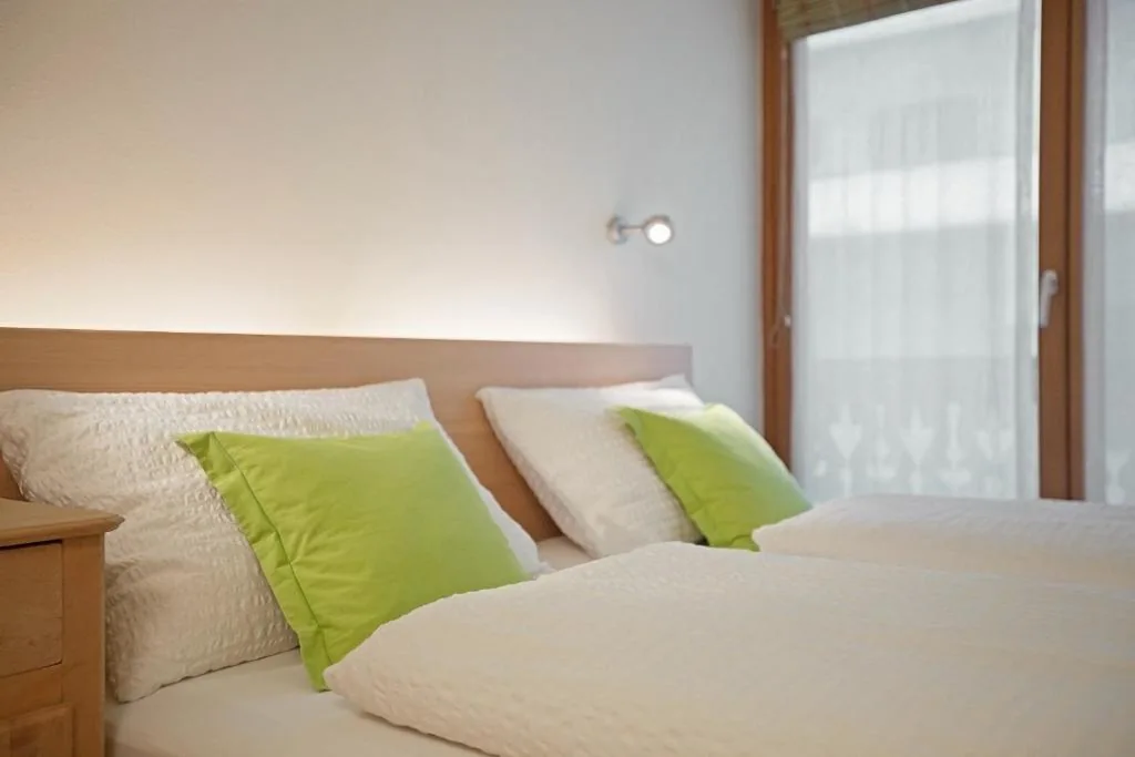 Camera Quadrupla con Balcone — Alpine Rooms and Suites Livigno – Camana Noa –