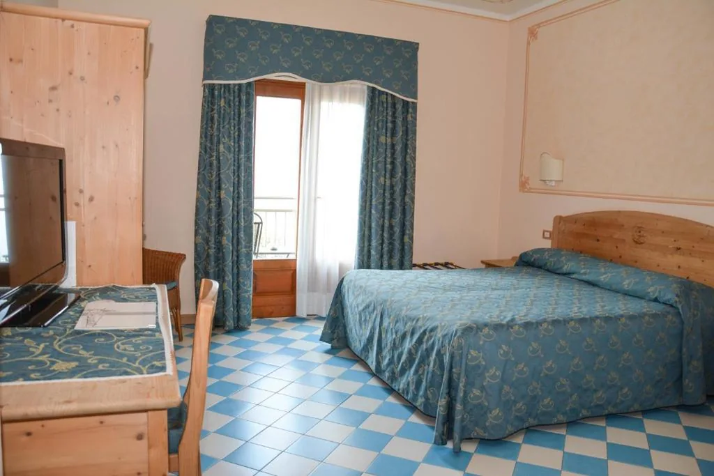 Quadruple Room with Balcony — Hotel Locanda Ruscello Garnì