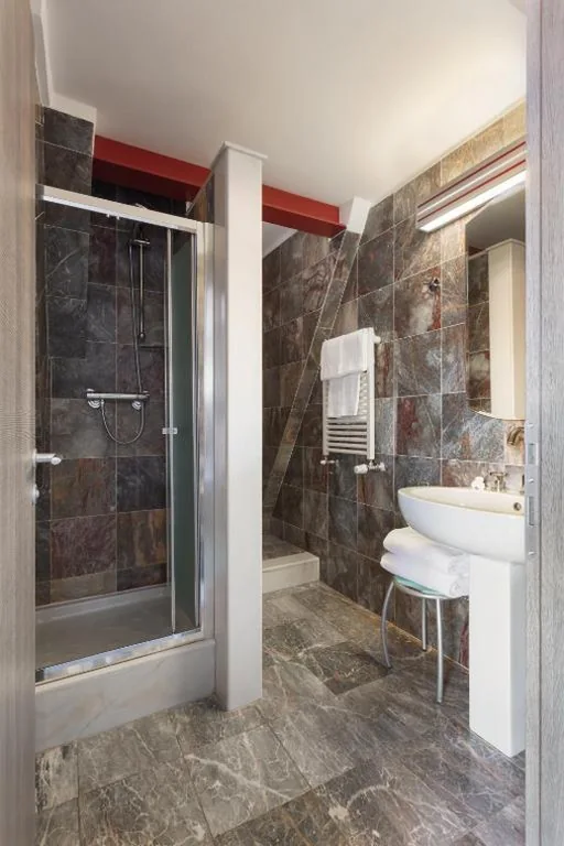 Quadruple Room with Balcony — Hotel Lombardia