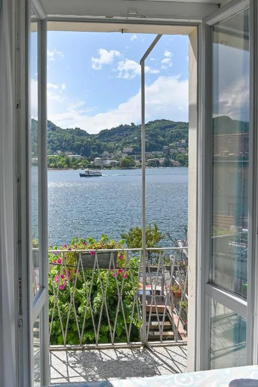 Quadruple Room with Balcony — Hotel Marco’s