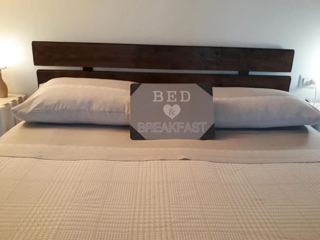 Quadruple Room with Balcony — La Casa Di Emma