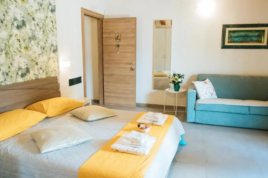 Quadruple Room with Terrace and Lake View — Valle dei Mulini – Lake Como