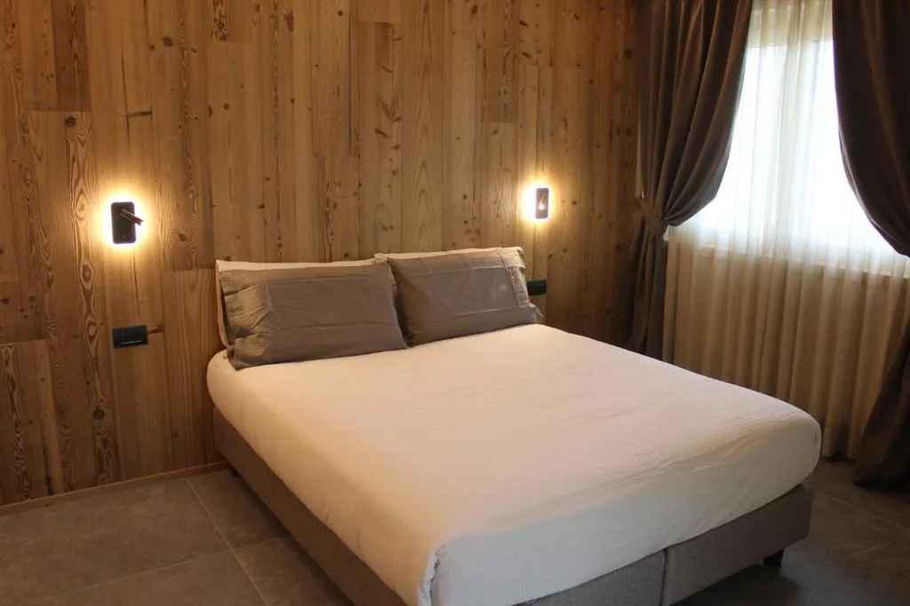 Quadruple Room with Terrace — Oltre Alpine Hotel
