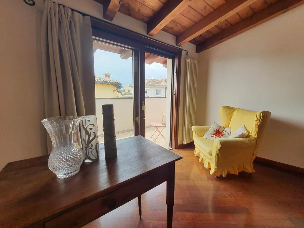 Quadruple Room with Lake View — Casa Teodora Sirmione