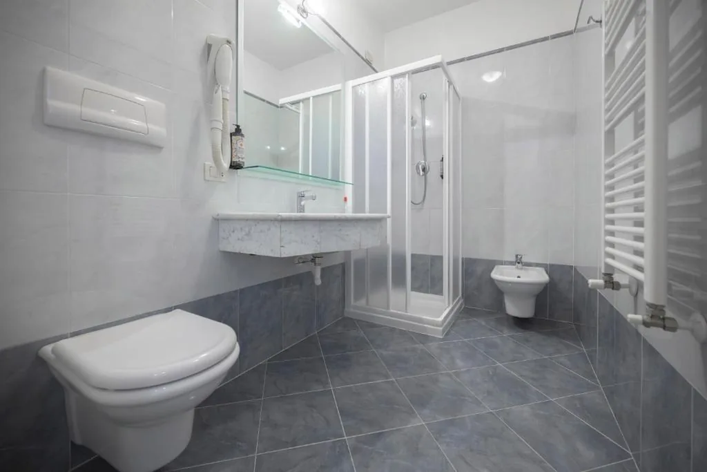 Camera Quadrupla con Vista Montagna — All Inclusive Hotel Piccolo Paradiso