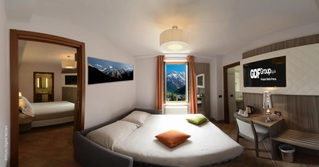 Camera Quadrupla con Vista Montagna — Hotel Garnì Cristallo