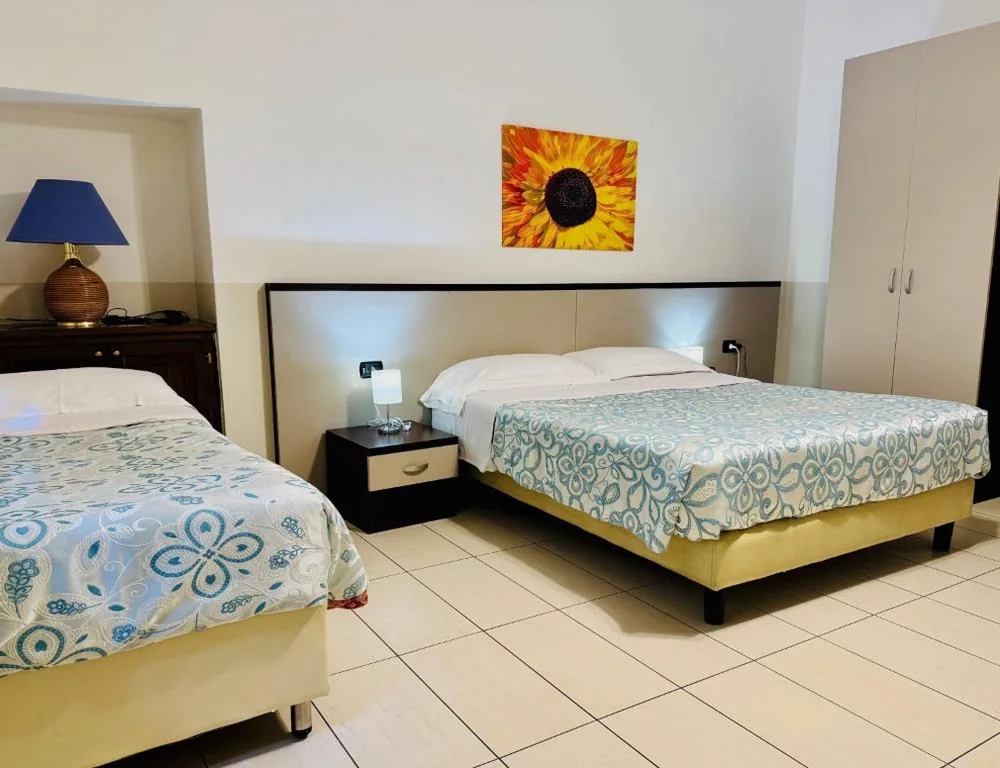 Deluxe Quadruple Room - Annexe — Hotel Marco’s