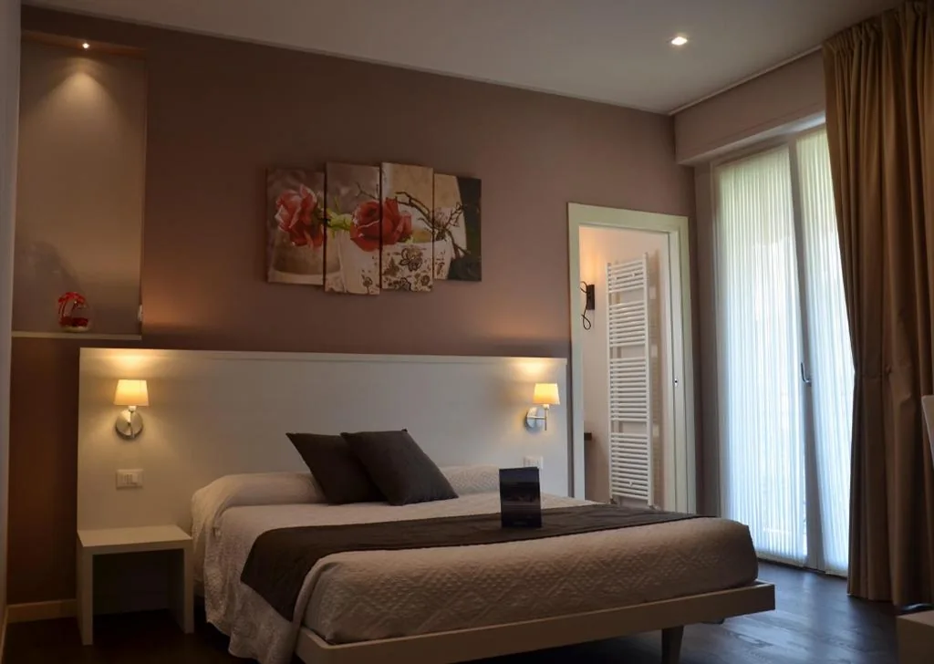 Deluxe Quadruple Room — H2o