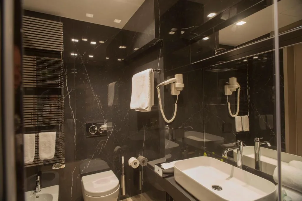 Deluxe Quadruple Room — Locanda Cavour