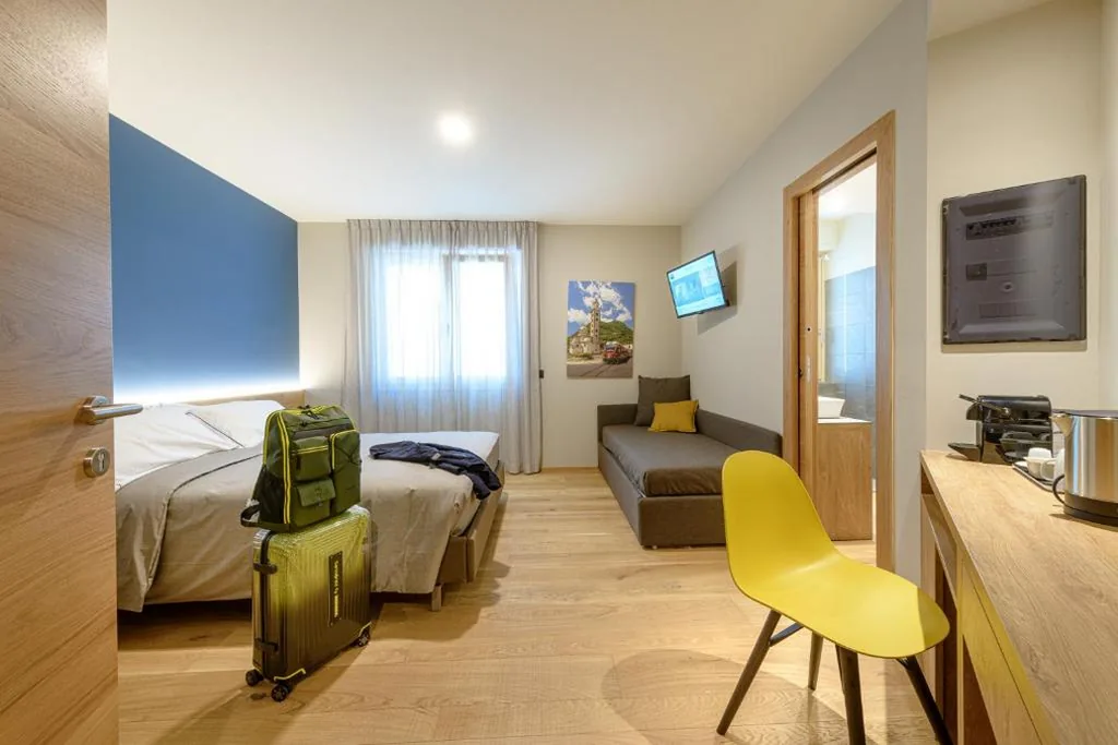 Deluxe Quadruple Room — SANMARTINO SUITE