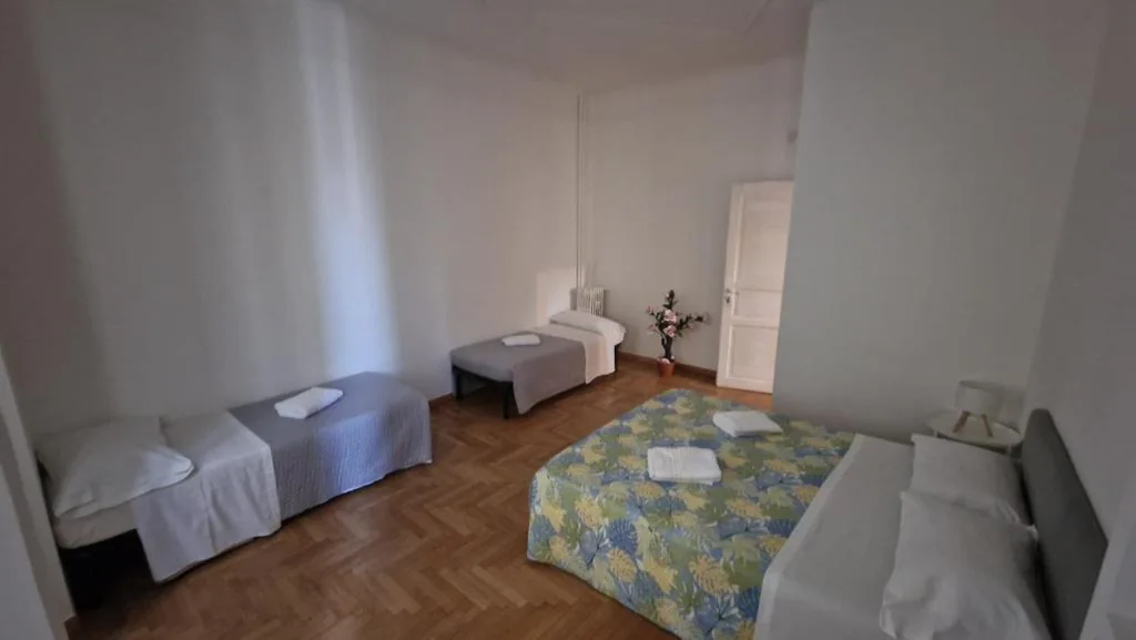Economy Quadruple Room with Shared Bathroom — Lilly Home