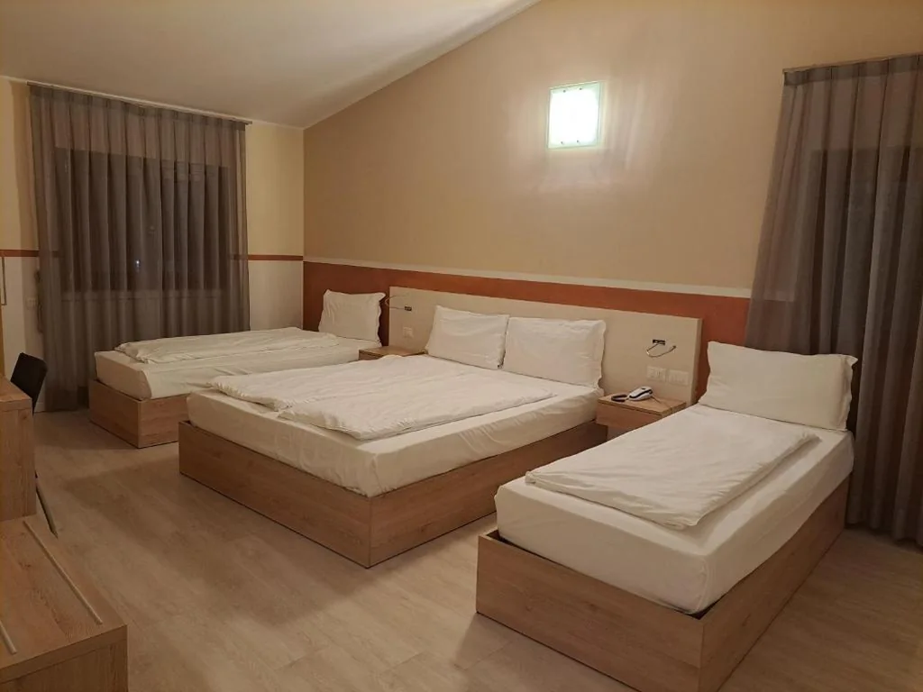 Camera Quadrupla Economy — Hotel Dogana