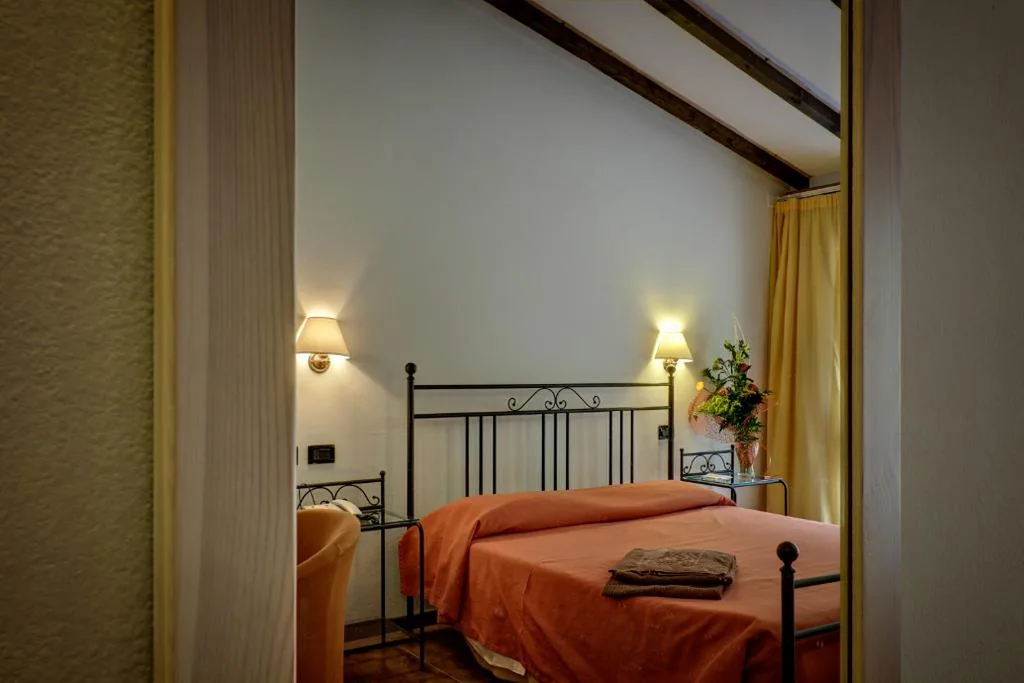 Quadruple Economy Room — Hotel Leonardo Da Vinci
