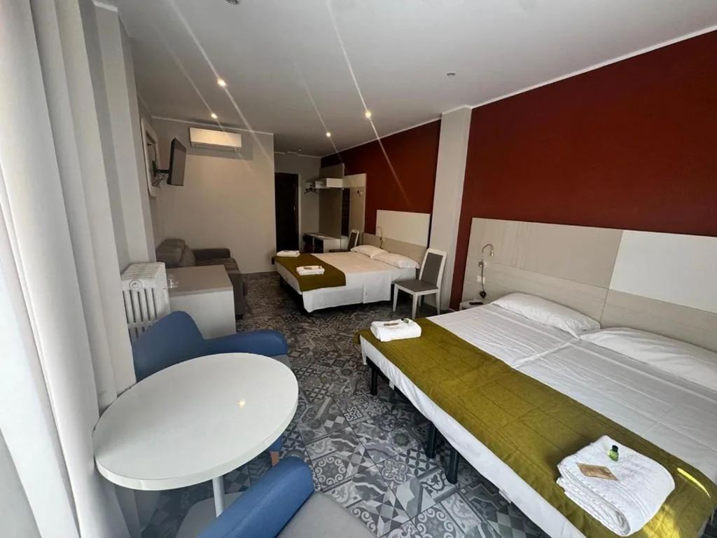 Economy Quadruple Room — Hotel Vintage Milano Centrale