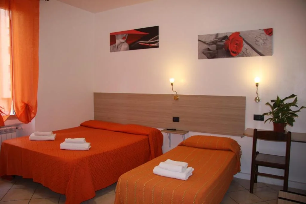 Quadruple Room — Hotel Adelchi