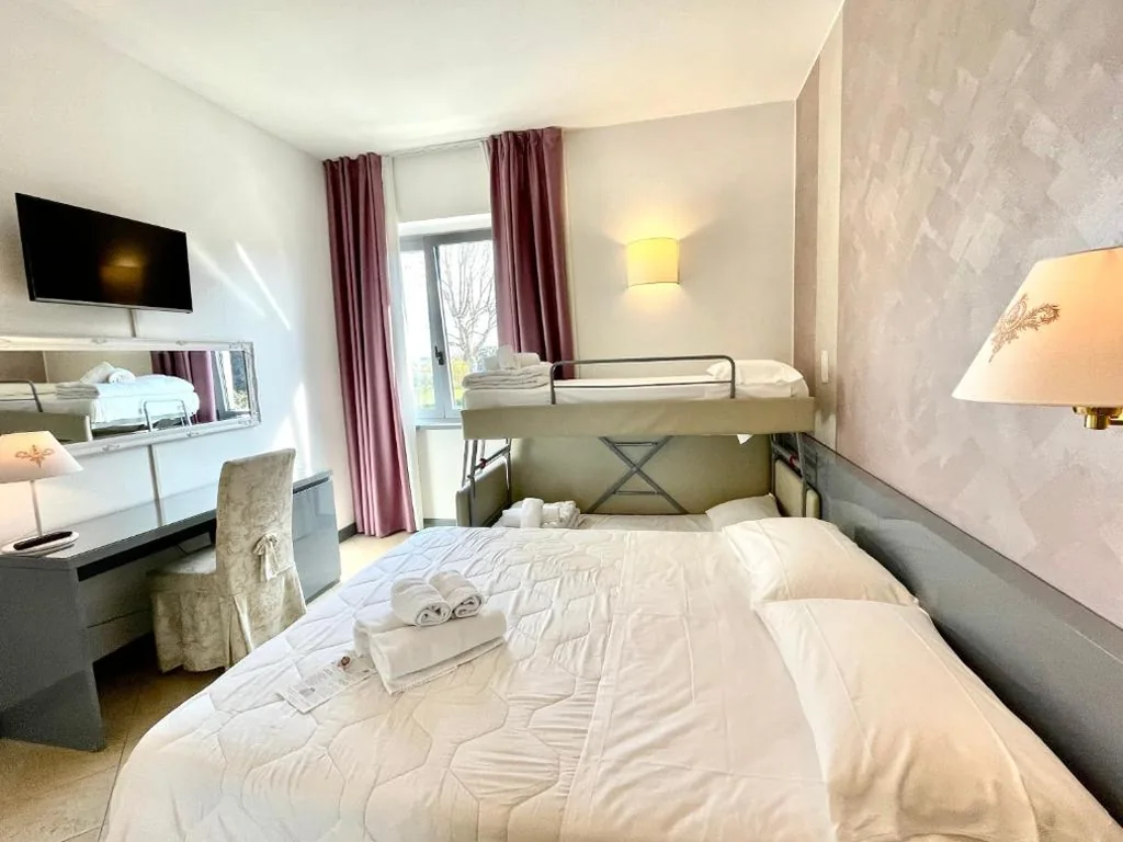 Quadruple Room — Hotel Alfieri