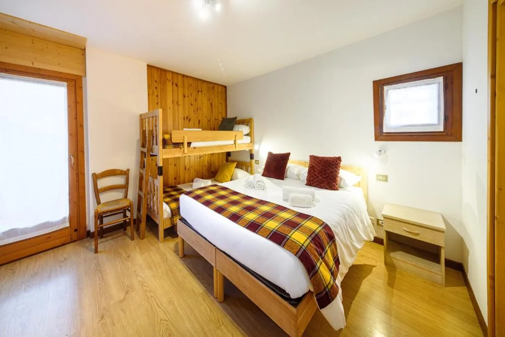 Quadruple Room — Hotel Ambassador Bormio