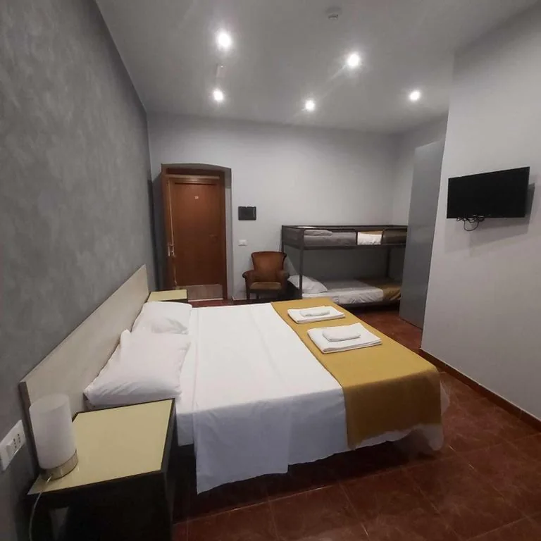 Quadruple Room — Hotel Convertini