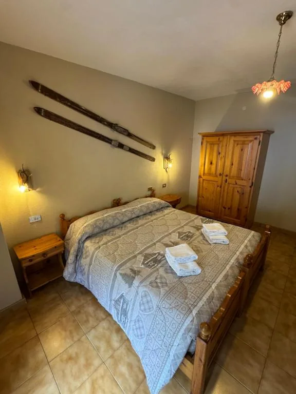 Quadruple Room — Hotel Genzianella