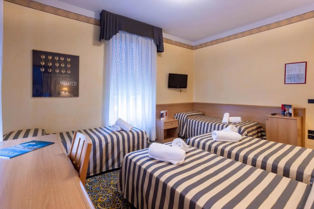 Quadruple Room — Hotel Giardinetto