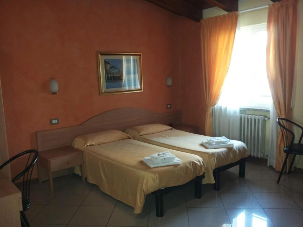 Quadruple Room — Hotel Le Querce